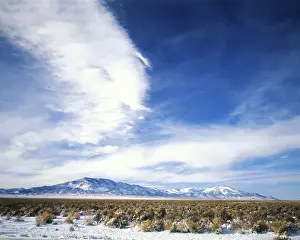 Spring Valley Prints: NEVADA. USA. Cirrus clouds above Spring Valley & Schell Creek Range in early winter