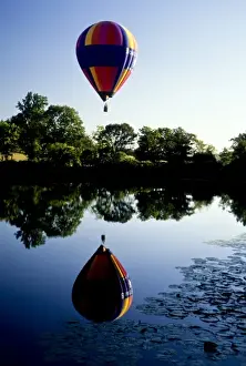 Lily Pond Prints: New Jersey, Oldwick, hot-air balloon aloft at sunrise over pond with water lillies
