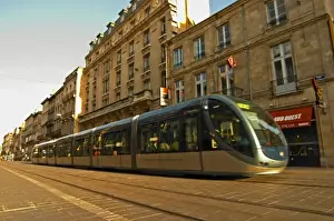 Tram Prints: The new modern tram on the posh shopping street Cours de l Intendence in Bordeaux