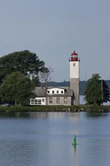 Riverfront Prints: New York State, Ogdensburg. Ogdensburg lighthouse located at the confluence of the St
