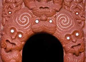 Rotorua Prints: New Zealand, Rotorua. Traditional Maori wood carving around entrance