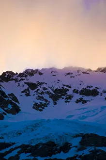 New Zealand, South Island, Arrowsmith Range. Sunset over Gridiron Glacier, a small