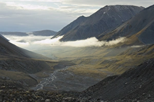 Images Dated 11th December 2006: New Zealand, South Island, Arrowsmith Range. Morning fog over Ashburton River valley