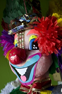 Nicaragua, Granada. Clown pinata on display in shop