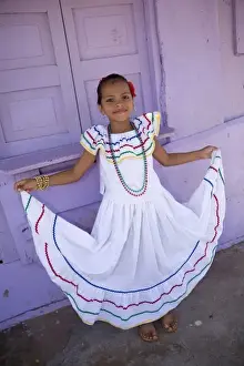 Granada Prints: Nicaragua, Granada. Girl in traditional dress after dance in Villa Esperanza barrio. (MR)