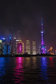 Cityscape Prints: Night view of high-rises by Huangpu River, Pudong, Shanghai, China