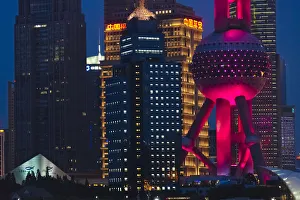 Shanghai Prints: Night view of Pudong skyline dominated by Oriental Pearl TV Tower, Shanghai, China