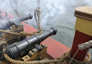 North America, Canada, British Columbia, Victoria. Deck cannon firing on the HMS Bounty