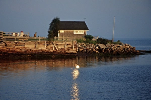 North America, Canada, New Brunswick, St Andrews. A shingled cottage overlooking
