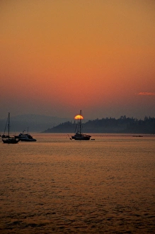 North America, Canada, New Brunswick, St Andrews. Boats in the harbor at sunset