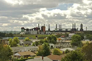 Images Dated 19th August 2007: North America, Canada, Quebec, Mauricie. View of an aluminum plant past the roofs