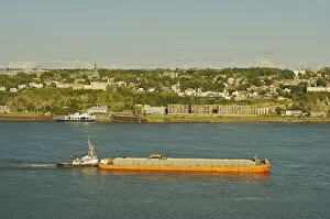 Images Dated 20th August 2007: North America, Canada, Quebec, Old Quebec City. View of a barge in the Saint Lawrence River