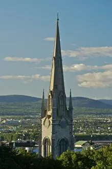 Images Dated 20th August 2007: North America, Canada, Quebec, Old Quebec City. Church spire with mountains in disatnace