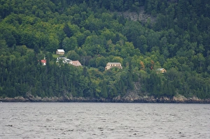 Images Dated 24th August 2007: North America, Canada, Quebec, Saguenay. View from the water of houses amongst trees