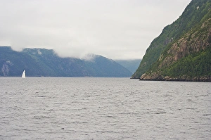 Images Dated 24th August 2007: North America, Canada, Quebec, Saguenay. View from the water of a sailboat on