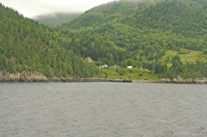 Images Dated 24th August 2007: North America, Canada, Quebec, Saguenay. Houses on misty hills near the banks of