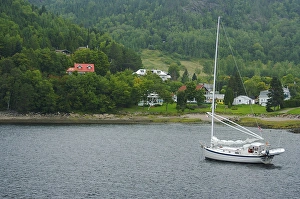 Images Dated 24th August 2007: North America, Canada, Quebec, Saguenay. A boat and houses of Sainte-Rose-du-Norde