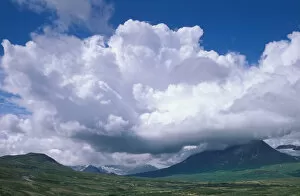 Images Dated 18th May 2005: North America, Canada, Yukon Territory summer clouds over mountains near Haines