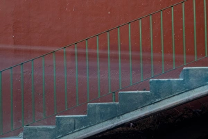 Images Dated 29th December 2011: North America, Mexico, Guanajuato. Stairs and railing against a red wall and blurred