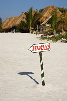 North America, Mexico, Quintana Roo, Tulum. A sign leading to a local craft booth