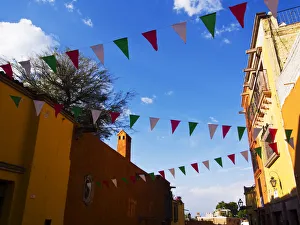 North America; Mexico; San Migel de Allende; Flags flying for the Day of the Dead celibration