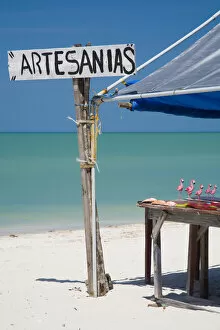 North America, Mexico, Yucatan. A sign on the beach advertising the local Artesanias