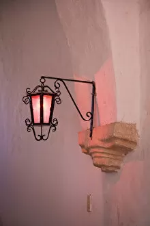 North America, Mexico, Yucatan, Valladolid. Lantern on inside wall of a church in