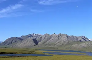 Images Dated 2nd August 2006: North America, USA, Alaska. Snow dusted peaks of the northern Brooks Range tower