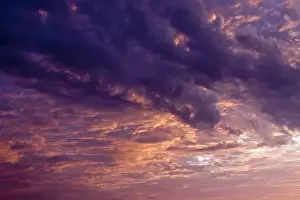 Images Dated 15th August 2009: North America; USA; Georgia; Tybee Island; Colorful clouds over the ocean