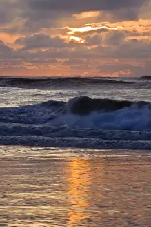 Tidal Prints: North America; USA; Georgia; Tybee Island; Waves in early morning light