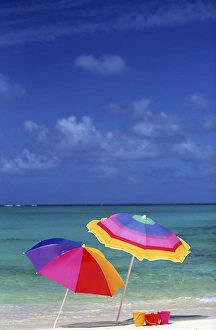 North America, USA, Hawaii. Beach scene, with umbrellas and beach toys