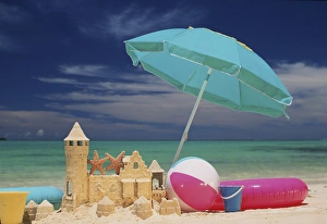 Starfish Prints: North America, USA, Hawaii. Beach scene, toys