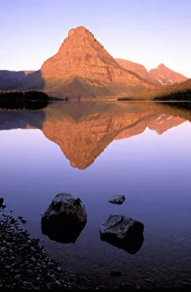 Images Dated 11th May 2006: North America, USA, Montana, Glacier National Park. Sinopah Mountain reflected in