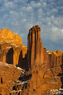 Geological Formation Prints: North America, USA, Utah. Fisher Towers with clouds and snow at sunset, near Castle Valley