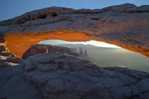 North America, USA, Utah. Overlook vista through Mesa Arch during winter at Canyonlands