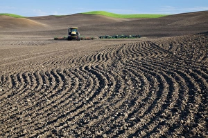 Images Dated 10th June 2009: North America, USA, Washington, Spring in Palouse Country Washington with tractor tilling