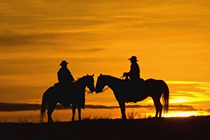 Images Dated 12th February 2008: North America; USA; Wyoming; Shell; Cowboys on ridge at Sunset; (MR)