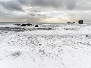 Images Dated 18th February 2015: North Atllantic coast near Vik y Myrdal during a winter storm with heavy gales. europe