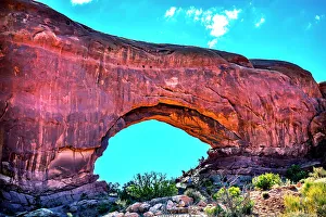 North window Arch Windows Section Arches National Park, Moab, Utah, USA. Red canyon walls and blue skies