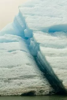Images Dated 25th July 2006: NorthAmerica, USA, AK, Inside Passage. Waterline cleft in upended iceberg