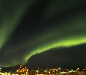 Northern Light Prints: Northern Lights over town and frozen Disko Bay. Greenland, Denmark