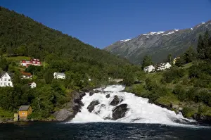 Housing Prints: Norway, Hellesylt. Waterfall that spills into Geirangerfjord at the port city of