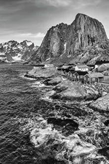 Images Dated 26th September 2022: Norway, Lofoten Islands. Hamnoy (Reine), Red Rorbuer (fishermen's cottages)