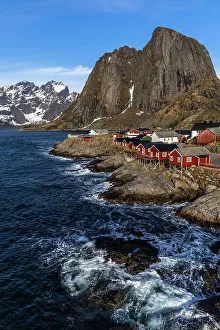 Images Dated 26th September 2022: Norway, Lofoten Islands. Hamnoy (Reine), Red Rorbuer (fishermen's cottages)