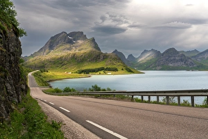 Lofoten Prints: Norway, Lofoten. Road next to fjord and mountain landscape