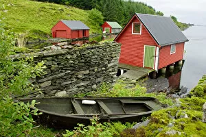 Norway, Radoy Island, Boathouses in Straumsvagen, Fosnstraumen trail from the quay