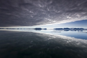Images Dated 2nd August 2008: Norway, Svalbard, Edgeoya Island, Reflection of low clouds in calm sea on summer
