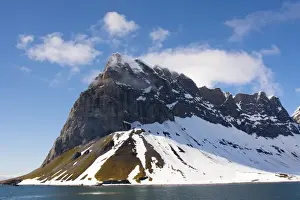 Northern Prints: Norway. Svalbard. Hornsund. Dramatic cliffs tower over the sound