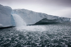 Images Dated 4th August 2008: Norway, Svalbard, Nordaustlandet, Melting water pours from ice face of Brasvellbreen