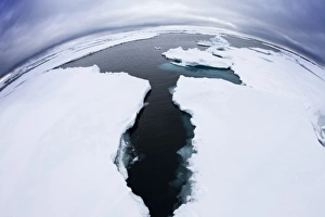 Norway, Svalbard, Nordaustlandet, Breaking sea ice and clearing snow storm in Murchison